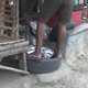 Illustration for article titled Here's An Incredibly Sketchy Way To Fix A Flat When You Don't Have The Right Equipment